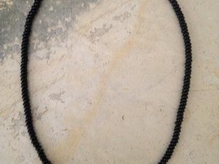 NECKLACE - Onyx beads 4mm, - sterling silver, with a white luster freshwater pearl - Pearl diameter .5” - Item Length 17” - Item #VM11 - $135