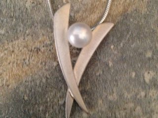 PENDANT NECKLACE - East meets west Pendant designed in Sterling silver with a white luster freshwater pearl on snake chain - Pearl diameter 7mm - Length 18” Item #VM04 - $175